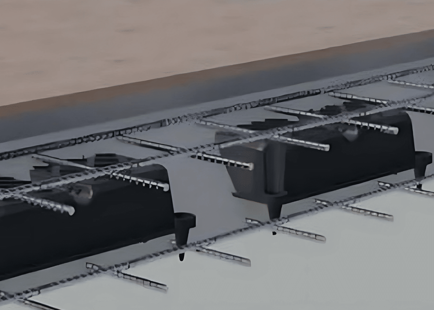 Lightweight EPS boards used as void formers in a reinforced concrete slab construction, manufactured to protect foundations from lateral heave and expansion in concrete structures, meeting customer requirements with standard sheet formats.